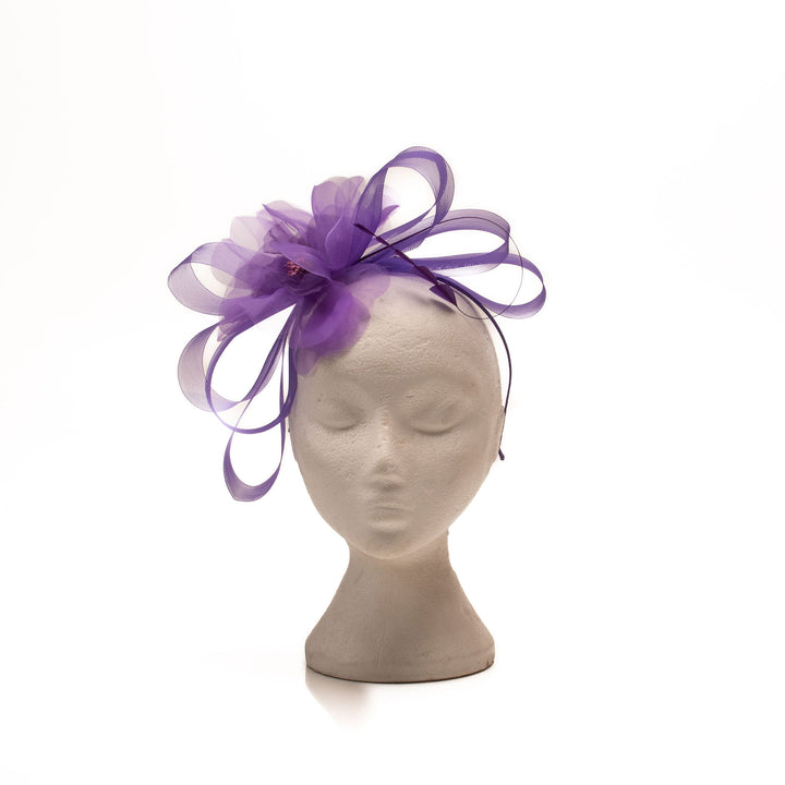 Purple Fascinator with Swirly Design